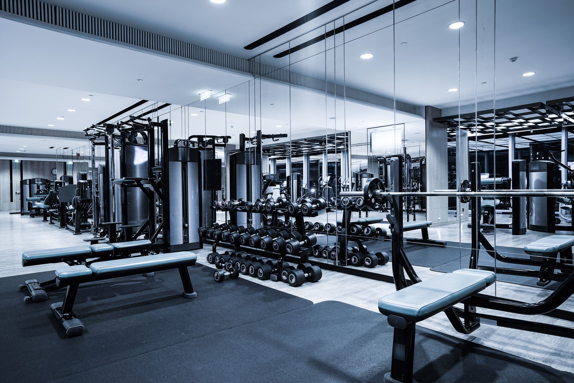 Fitness club in luxury hotel interior.